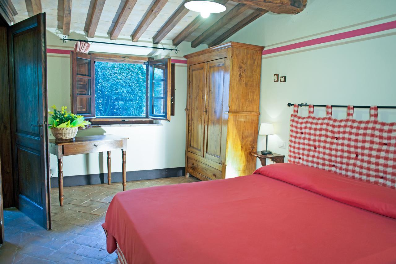 チニジャーノ Residenza Storica Casale Pozzuoloヴィラ 部屋 写真
